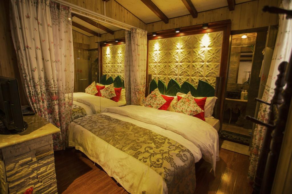 Hôtel Secret Garden à Lijiang  Chambre photo