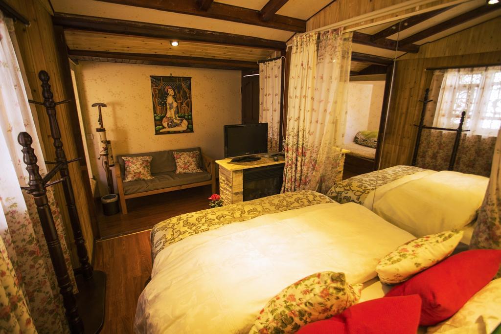 Hôtel Secret Garden à Lijiang  Chambre photo